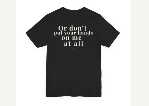 Black t-shirt with white text on a design software interface